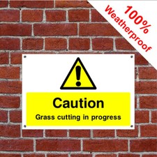 Caution grass cutting in progress sign CONS069 Warning and hazard notices