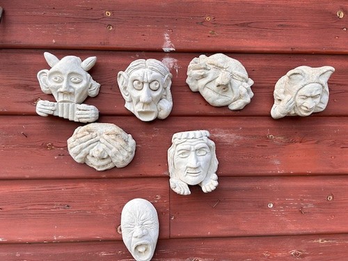 Funny face old stone wall - old,