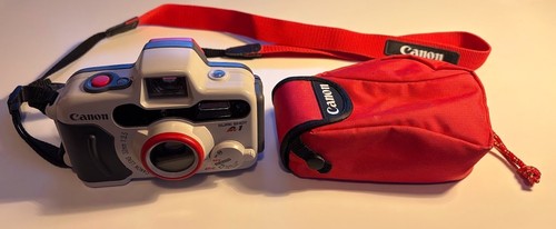Canon sure shot - point, &
