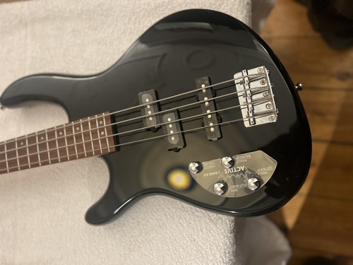 Cort left handed four - -, string
