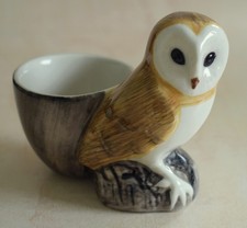 QUAIL BIRD EGG CUP - BARN OWL STANDING IN FRONT OF EGG CUP - A
