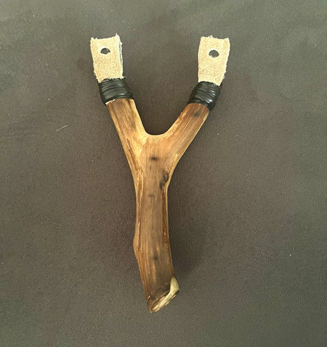 Wooden carved catapult with