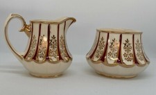 Sadler creamer and open sugar bowl carousel pattern (3194) unusual red colour 