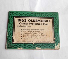 1963 Oldsmobile owner protection plan book with plates vintage