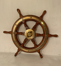 A vintage Simpson Lawrence 6 spoke wooden and brass ships wheel