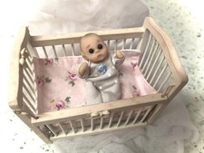 Polymer clay baby ,artist