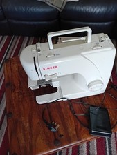 Singer Sewing Machine Turns On