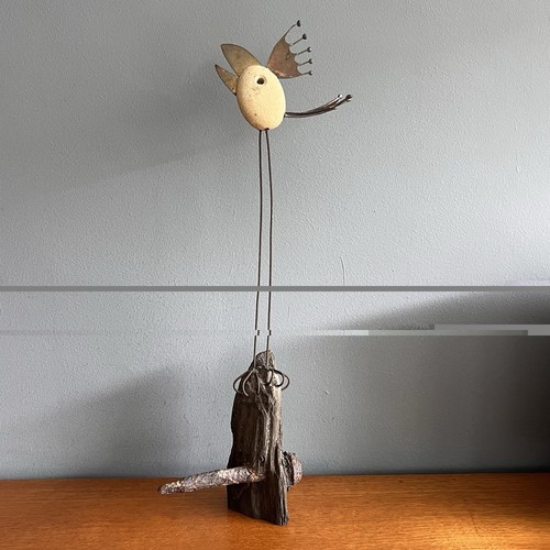 Wire and pebble art - and,