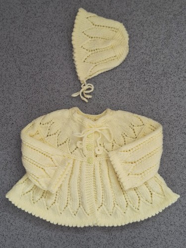 Hand knitted baby girl lemon