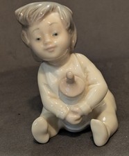 Nao Lladro "Bedtime Snack"