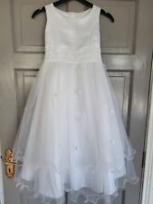 Beautiful communion dress age 8. White with sequence detailing.