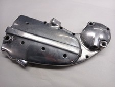 Sportster "ironhead" cam cover with new bushings.                  Needs repair.