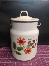 Vintage enamelware milk jug w/flowers and stars/great shape9  1/2by6inches