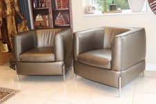 2 Natuzzi armchairs In Rusty