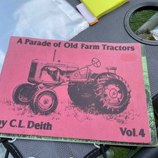 A PARADE OF OLD FARM TRACTORS