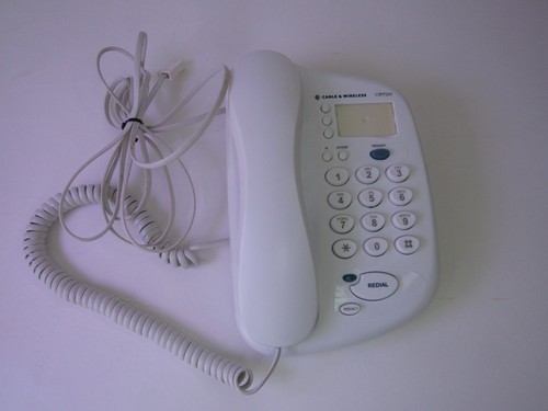 Corded white phone with curves - white,