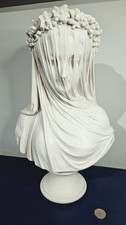 A Cast Marble Sculpture Of The
