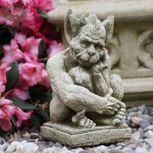 Resting gargoyle stone statue - resting,