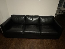 Black leather sofa, used for