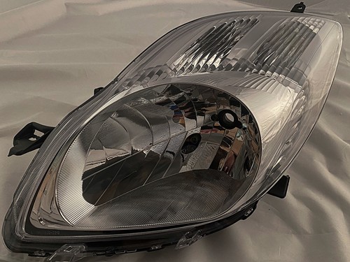 Toyota yaris headlight - toyota,