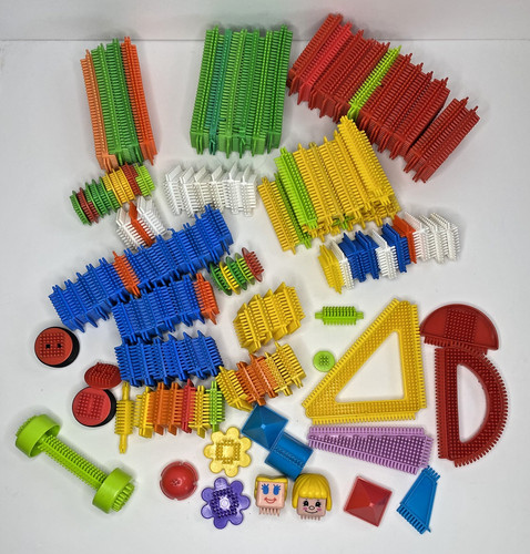 Stickle bricks with - , people