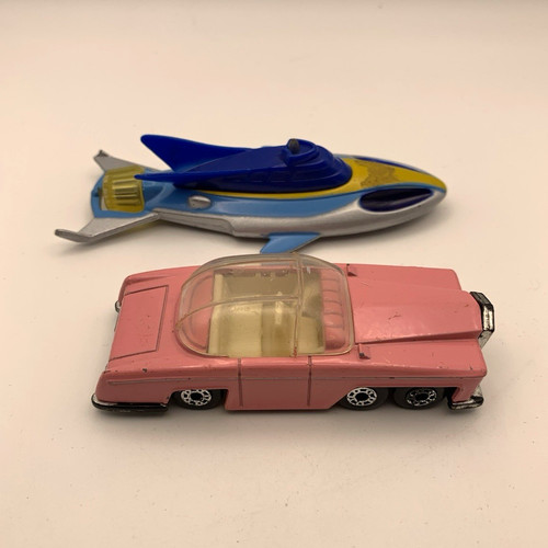 Vintage diecast plastic toy - &,