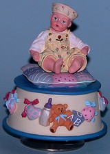 Madame Alexander resin doll "Yellow Rosebud" #90610 music box rotates baby