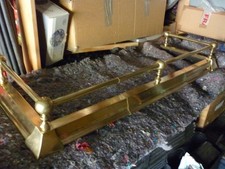 VINTAGE SMALL BRASS EXTENSIBLE FIREPLACE FENDER