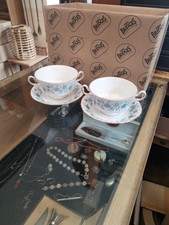 PAIR OF COLCLOUGH BRAGANZA BONE CHINA TWO-HANDLED SOUP COUPES & SAUCERS