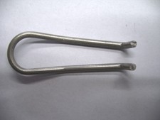 Tension spring on the arm of