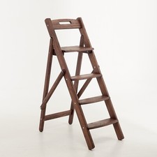 A wooden folding ladder made of oak for home, kitchen,library,flower stand.