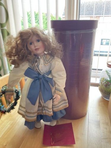 Samuel porcelain doll on - h.s.,