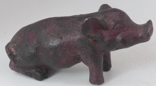 Patinated bronze pig - patinated,