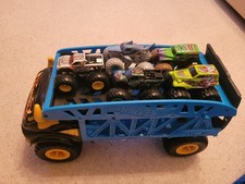 Hot Wheels Monster Trucks Diecast Cars Monster Mover Transporter with 5  Trucks