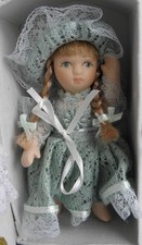Doll new in box with spare