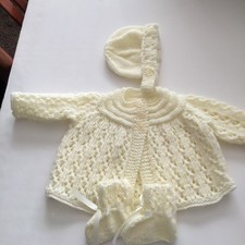 New hand knitted babies 3 piece baby matinee set in cream dk yarn to fit 16"