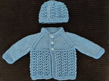 Hand knitted blue prem baby