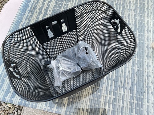 Front basket with fixing for