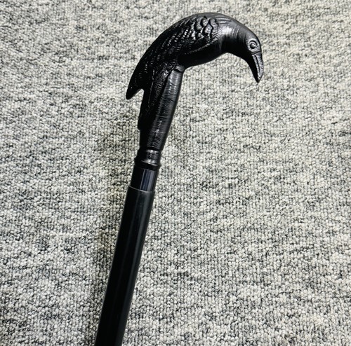 Antique black brass crow head - black,