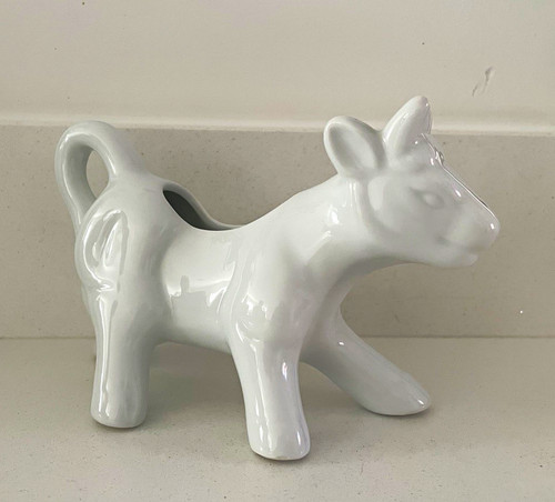 White glossy ceramic cow - glossy,