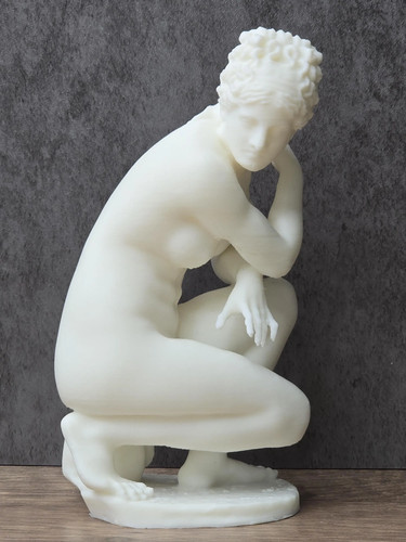 Crouching venus statue - crouching,