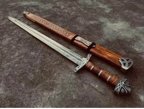 Hand forged damascus steel - hand,