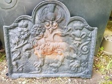 Antique fire back, cast iron