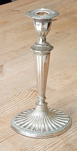 Silver plated candlestick by - a,