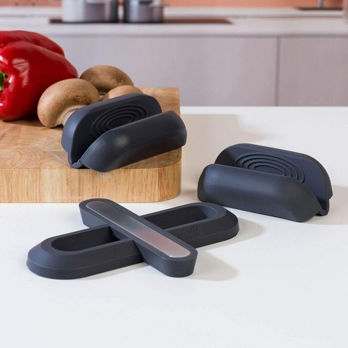 Trivet and pot holder - and,