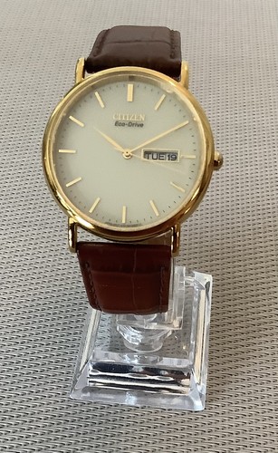 Citizen eco drive - gold, tone