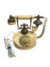 Cradle handset rotary dial