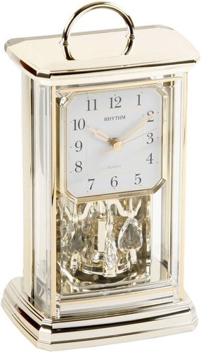 Rhythm mantel clock - mantel, rotating