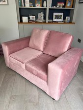Pink two seater sofa. Brand new. 144 x 90 x 58cm