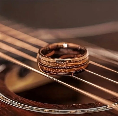 Guitar string ring - string, wood